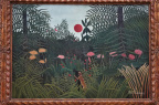 Henri Rousseau - Paysage de forêt vierge avec le soleil couchant (nègre et jaguar)